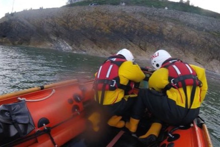 Lifeboat goes to help two people trapped by Spring Tide